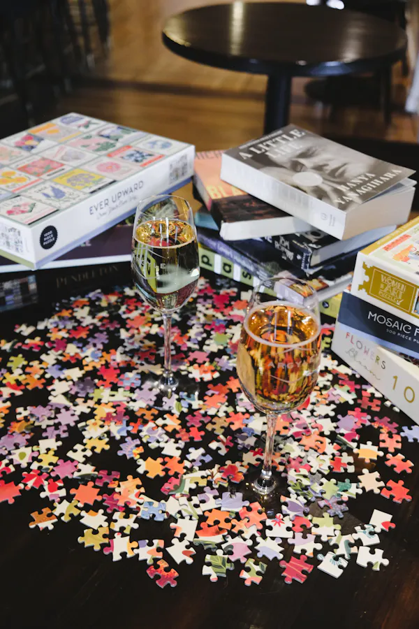 table, drinkware, jigsaw puzzle, alcoholic drink, stemware, liquor