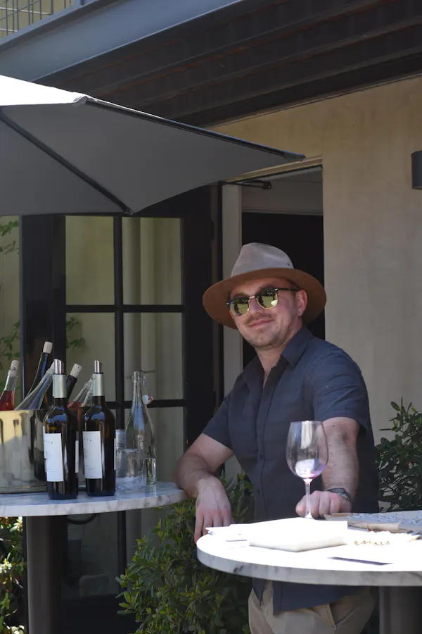 hat, headgear, sun hat, furniture, alcoholic drink, drinkware