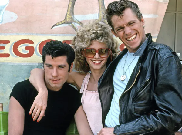 clothing, hair, smile, happiness, facial expression, leather jacket