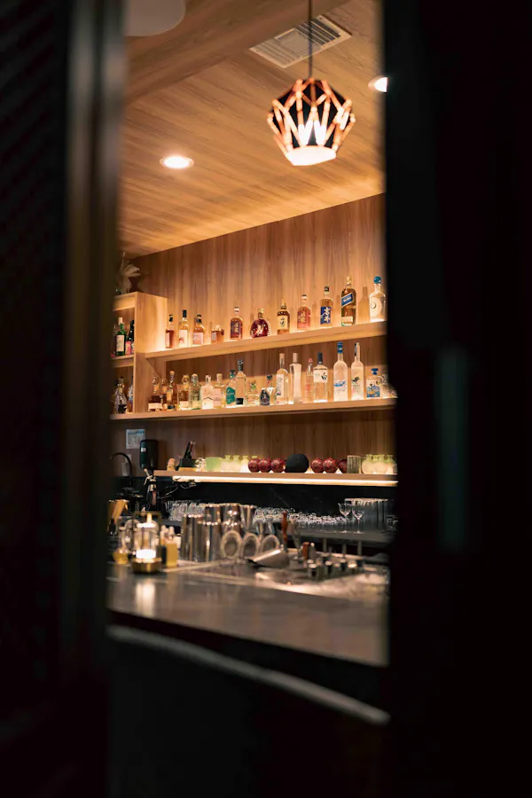 ceiling, light fixture, bar, wood stain, shelving