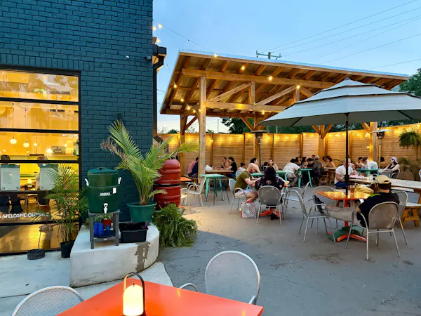furniture, chair, restaurant, outdoor table, outdoor furniture, umbrella