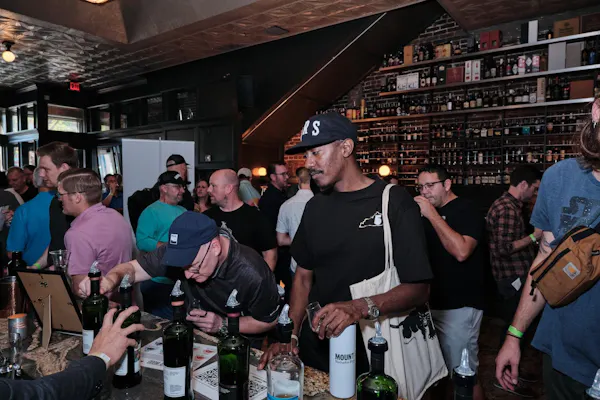 t-shirt, hand, alcoholic drink, shirt, hat, barware