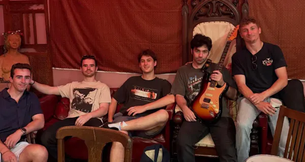t-shirt, chordophone, guitar, musical instrument, jeans, guitarist