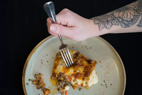 food, hand, tableware, kitchen utensil, ingredient, fork