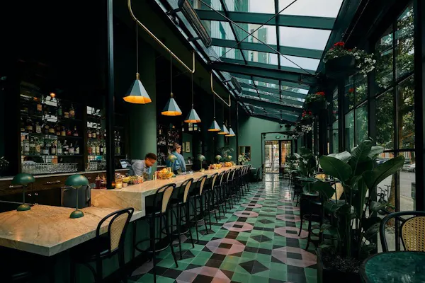 furniture, restaurant, chair, outdoor table, outdoor furniture, shade