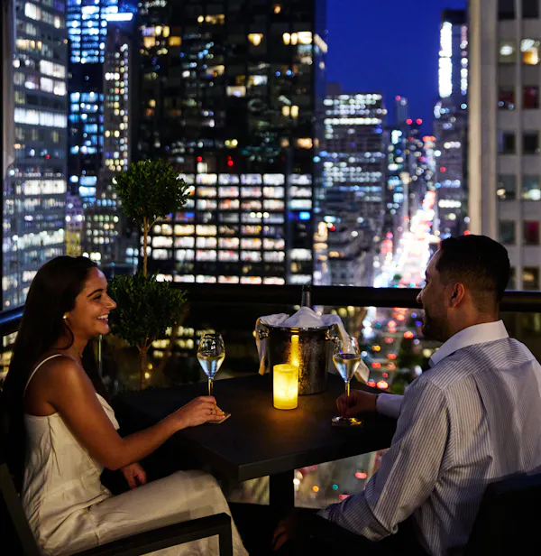 table, furniture, building, skyscraper, tableware, lighting