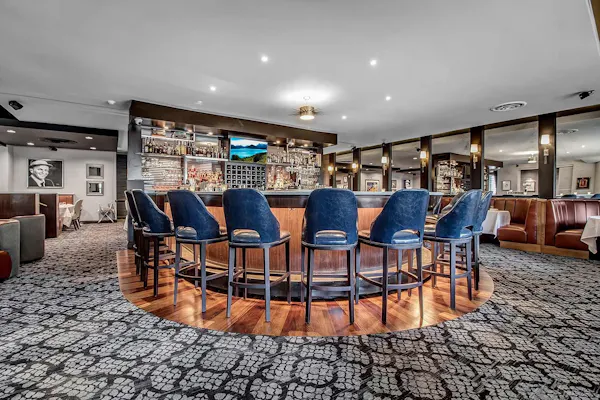 furniture, chair, floor, flooring, hall, shelf
