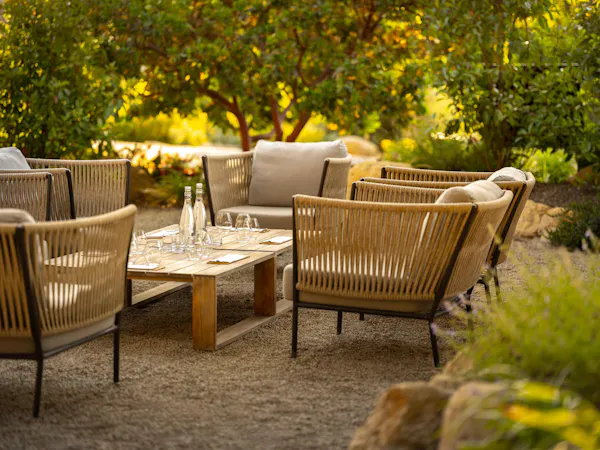 furniture, outdoor furniture, chair, outdoor table, wicker, armrest