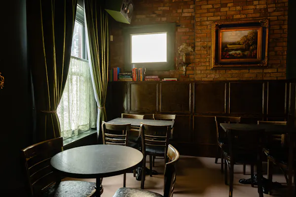 table, furniture, property, picture frame, window, chair