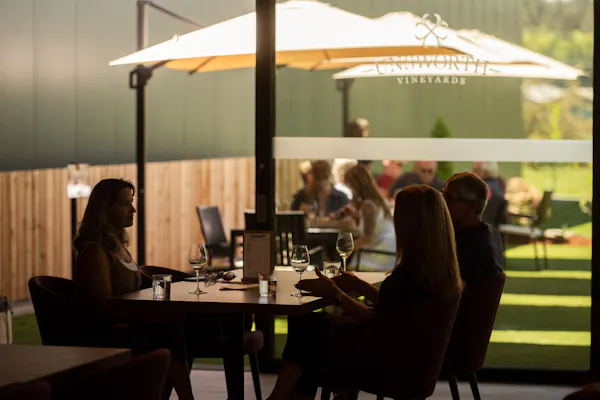 furniture, table, chair, restaurant, umbrella, outdoor table