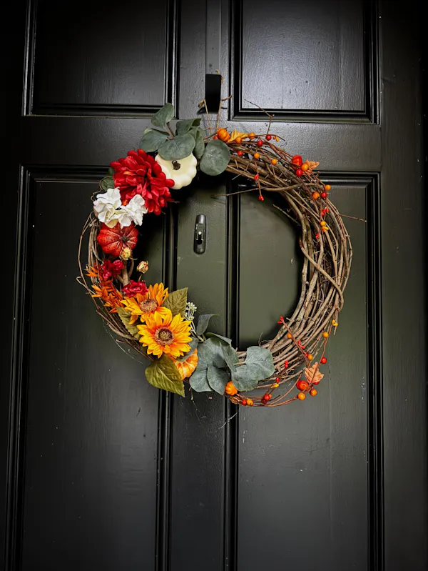 wreath, orange, floristry, flower arranging, creative arts, cut flowers