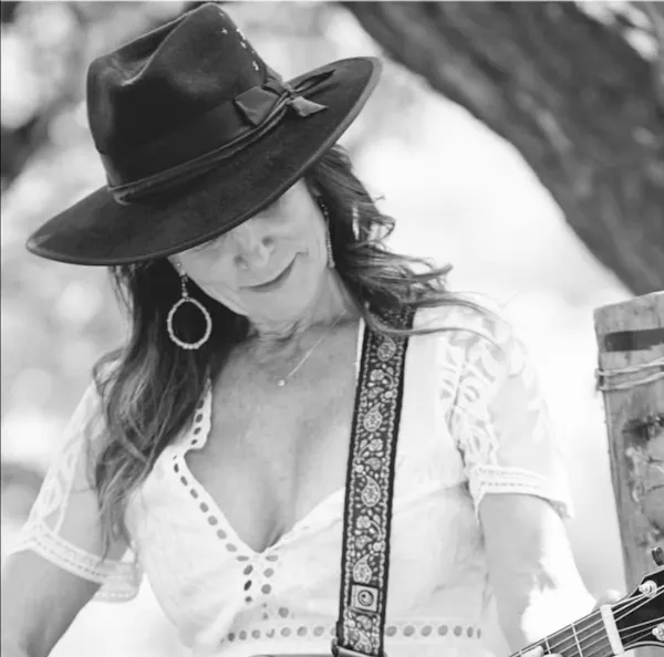 string instrument, plucked string instrument, chordophone, hat, guitarist, guitar