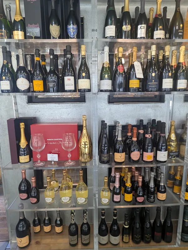 bottle, alcoholic drink, glass bottle, shelving, shelf, wine bottle