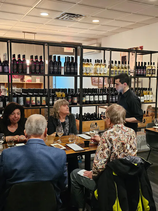 drinking establishment, bottle, shelf, barware, coat, customer