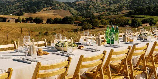 furniture, table, tablecloth, chair, restaurant, outdoor furniture