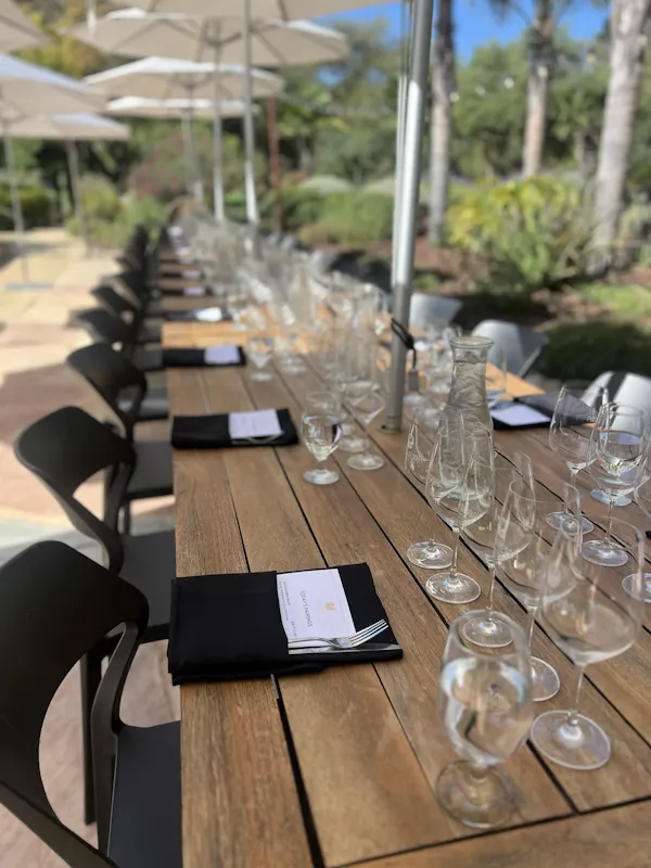 furniture, table, restaurant, outdoor furniture, drinkware, chair