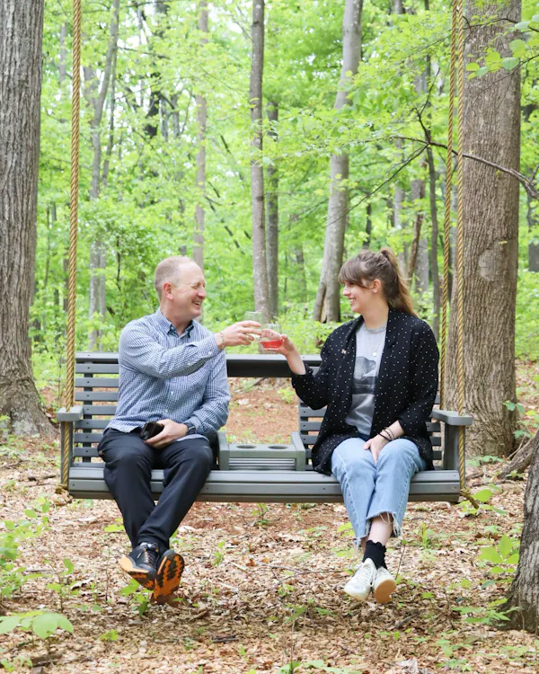 outdoor bench, footwear, bench, shoe, outdoor furniture, trousers