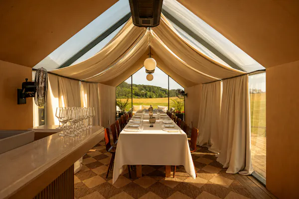 furniture, table, restaurant, tent, ceiling, serveware