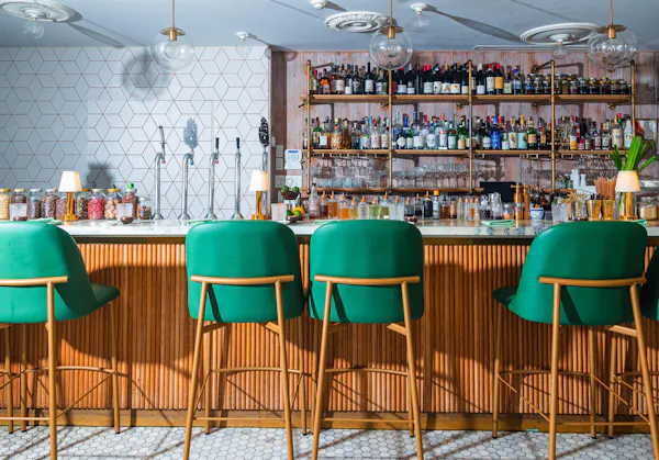 property, furniture, shelf, bottle, shelving, chair
