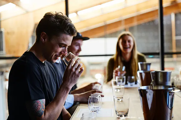 tableware, table, drinkware, alcoholic beverage, barware, smile