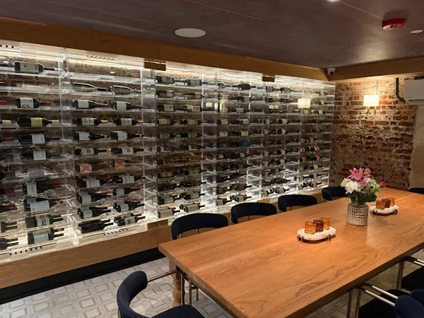 furniture, shelf, shelving, ceiling, chair, light fixture