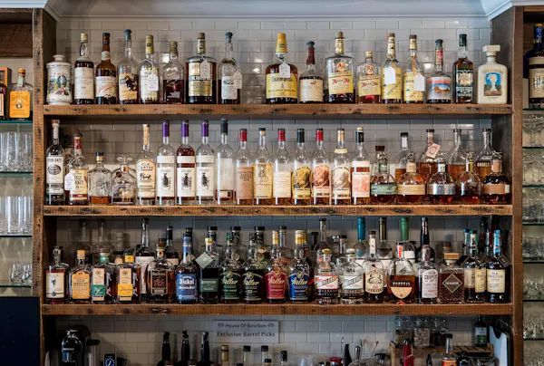bottle, drinking establishment, drinkware, glass bottle, shelf, barware