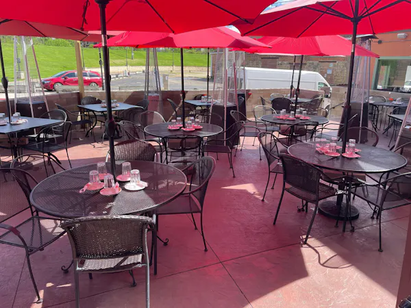 table, furniture, property, outdoor table, chair, umbrella