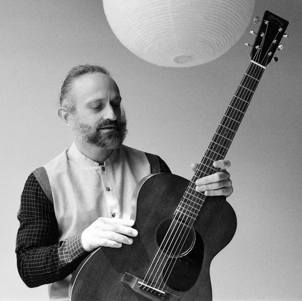 musical instrument, string instrument, facial hair, beard, plucked string instrument, chordophone