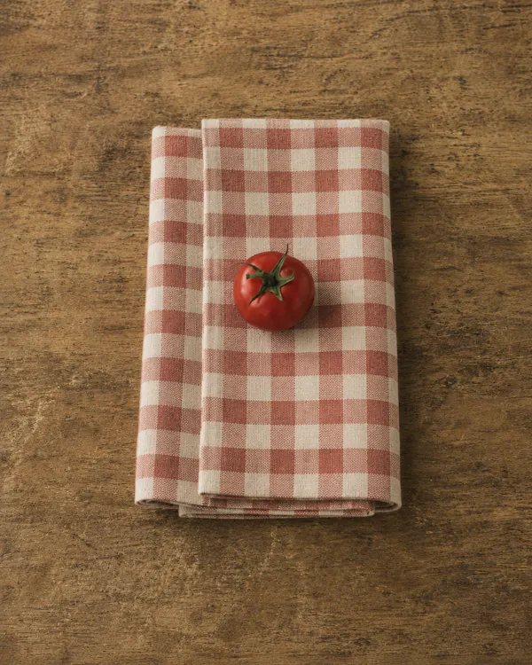 linens, tablecloth, food, produce, napkin, cutting board