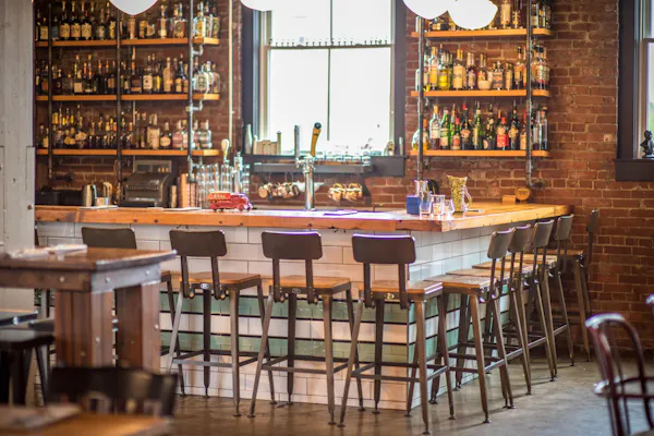 furniture, window, drinking establishment, bottle, barware, shelf