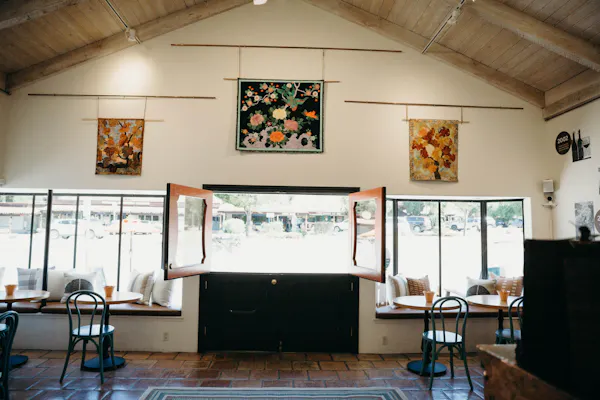 ceiling, furniture, light fixture, restaurant, chair, wood stain