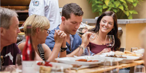 tableware, drinkware, shirt, food, table, alcoholic drink