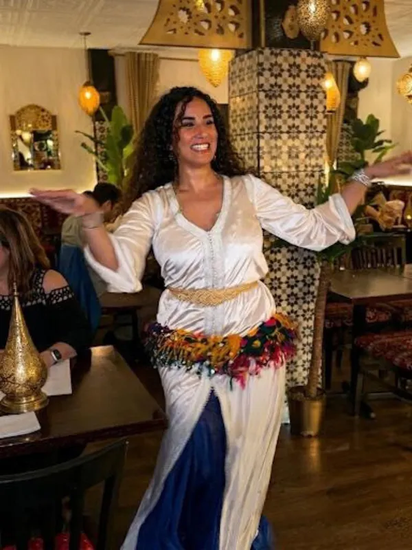 smile, entertainment, performing arts, tradition, costume, chair