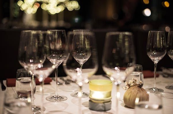 wine glass, stemware, drinkware, glass, champagne stemware, restaurant