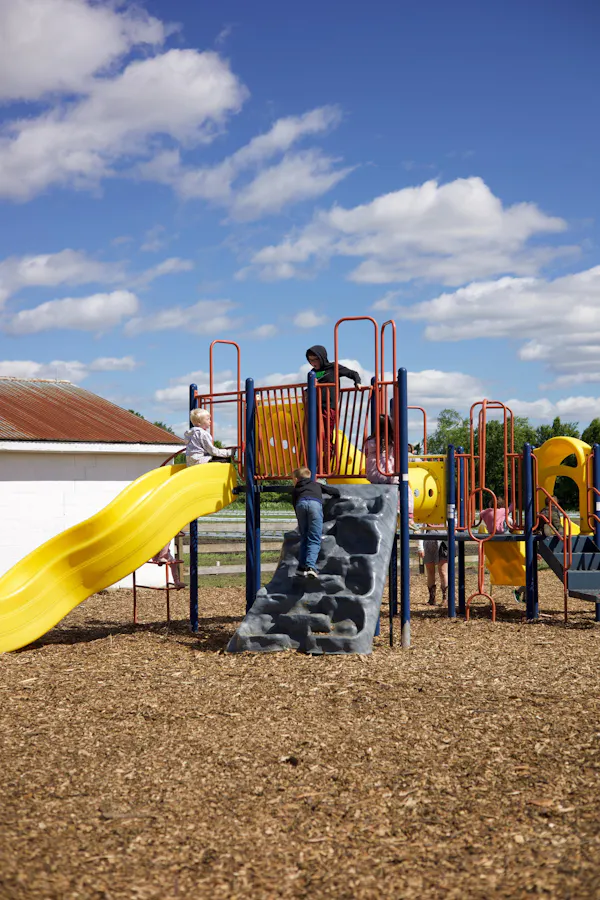 playground slide, outdoor play equipment, recreation, public space, chute, playground