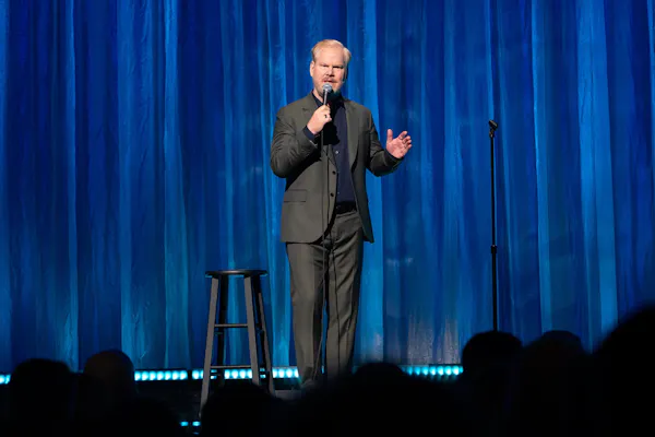audio equipment, formal wear, trousers, standing, stage, event