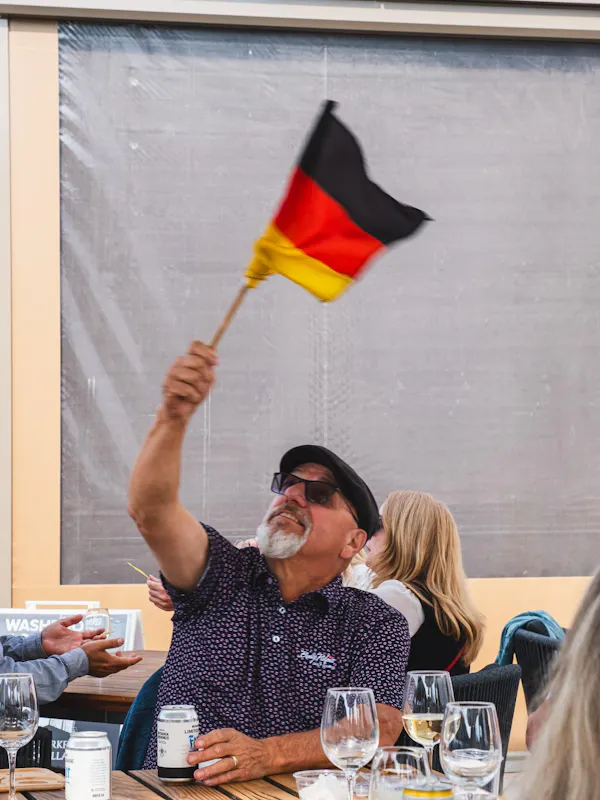 facial hair, sunglasses, goggles, flag