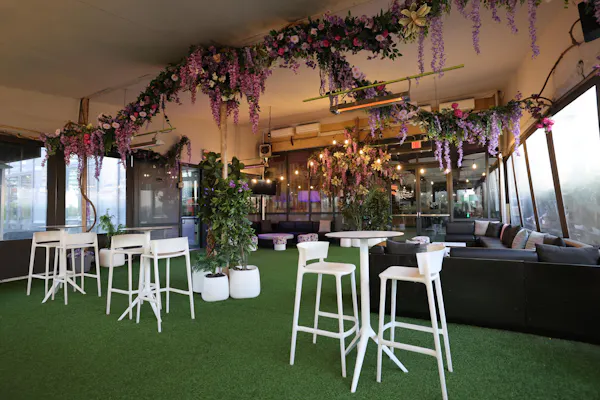 chair, houseplant, flowerpot, floral design, restaurant, daybed