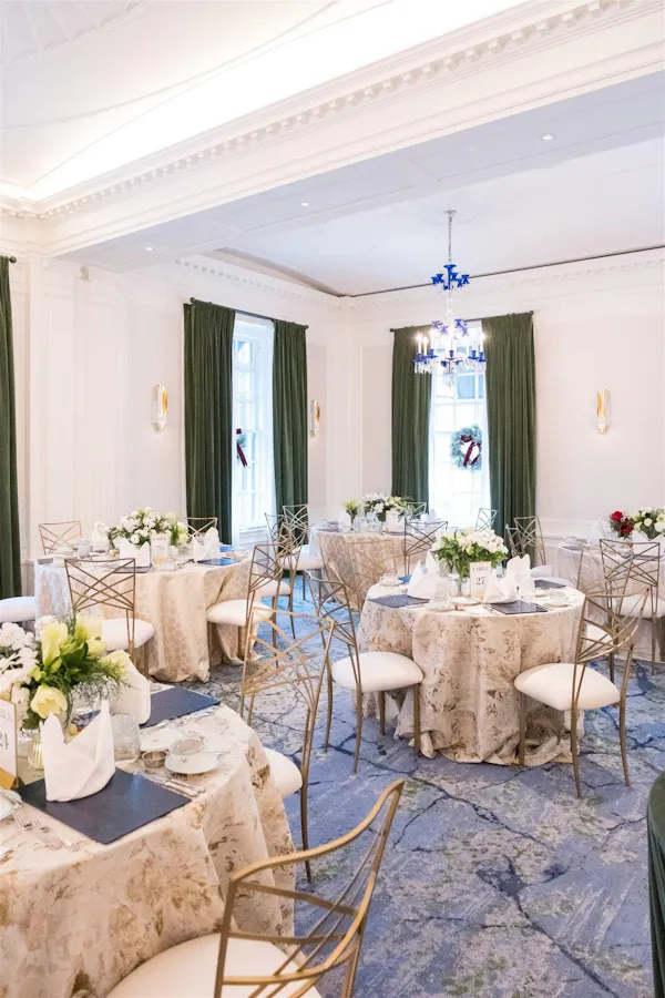 furniture, chair, ceiling, tablecloth, linens, flower arranging