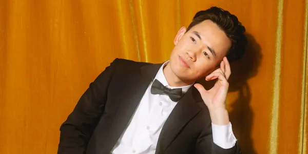 chin, bow tie, forehead, collar, formal wear, facial expression