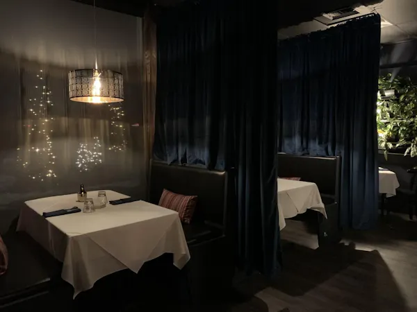 furniture, table, tablecloth, chair, curtain, textile