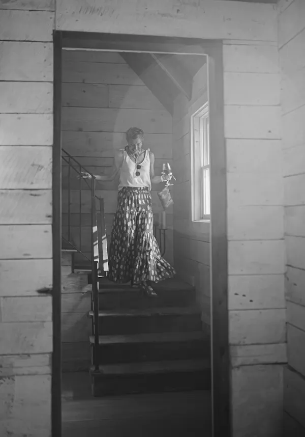 flash photography, standing, stairs, black-and-white, grey, style
