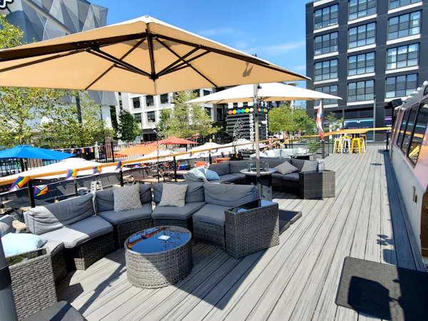 building, sky, shade, outdoor furniture, table, chair