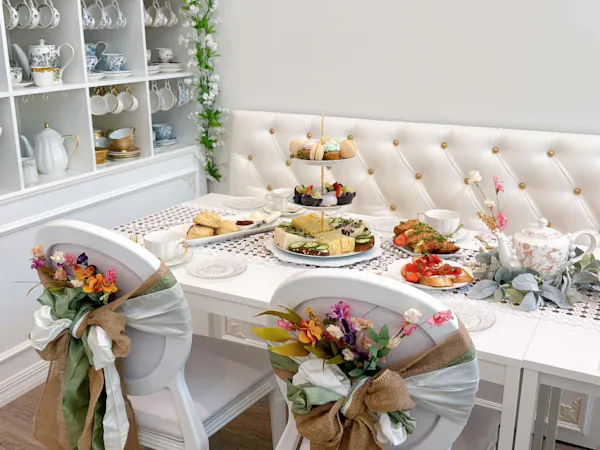 furniture, table, tableware, cake, cut flowers, chair