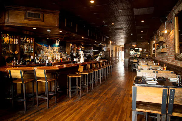 drinking establishment, table, building, barware, chair, shelf