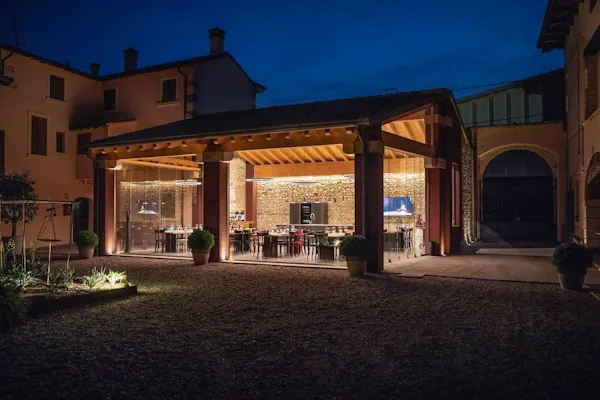 chair, outdoor structure, light fixture, shade, restaurant, courtyard