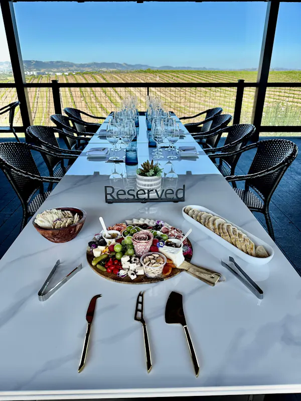 furniture, table, tableware, restaurant, chair, glass