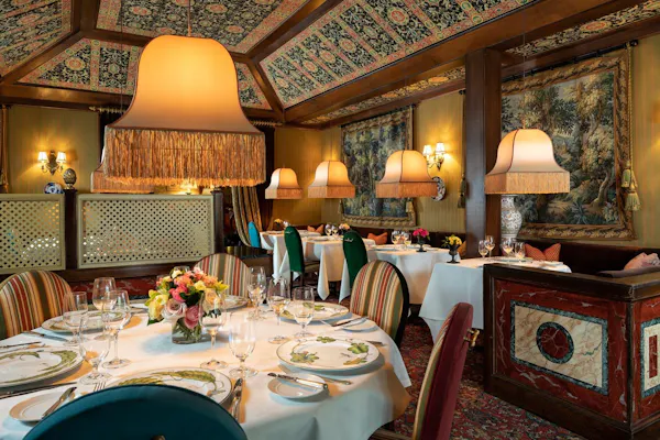 furniture, table, light fixture, restaurant, ceiling, tablecloth