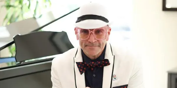 eyewear, bow tie, glasses, vision care, hat, collar