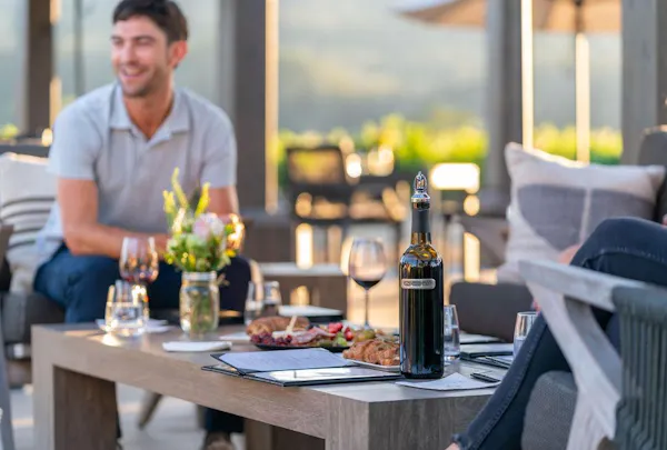 table, furniture, tableware, property, bottle, chair